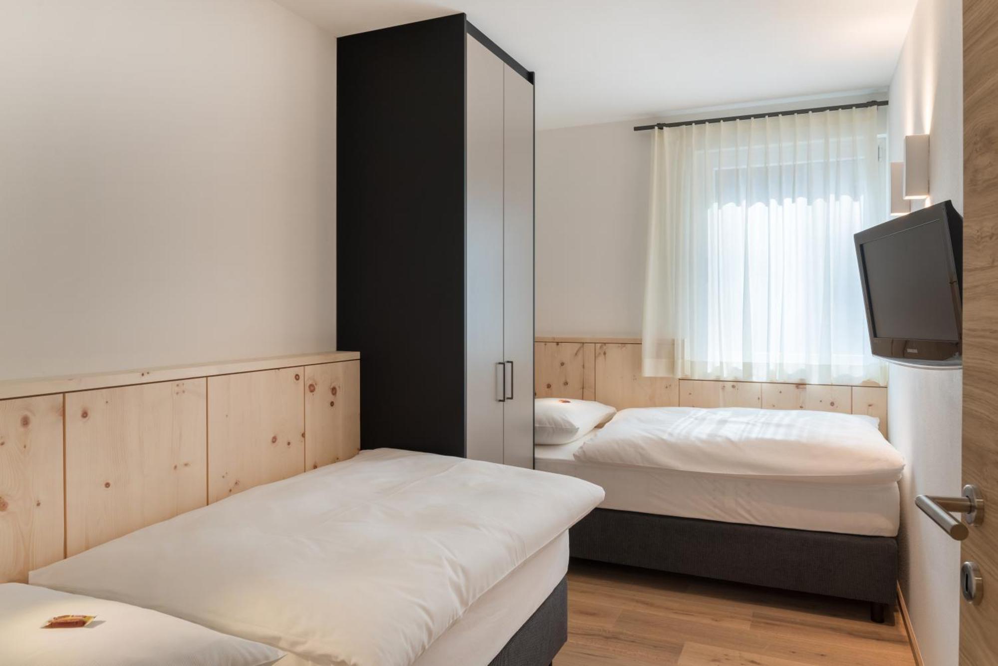 Alpenwellnesshotel St. Veit Sexten Camera foto